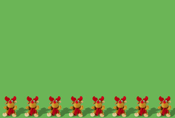 reindeer on bottom of green background, above copy space, creative art design
