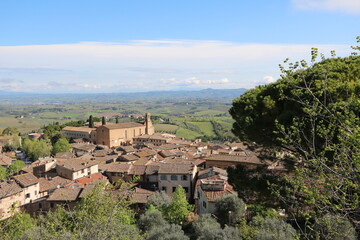 Fototapeta na wymiar View to Chiesa di Sant'Agostino in San Gimignano in spring, Tuscany Italy