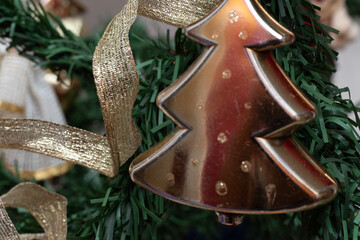   golden christmas ornaments on white background