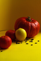 still life with pumpkin, lemon and tangerines