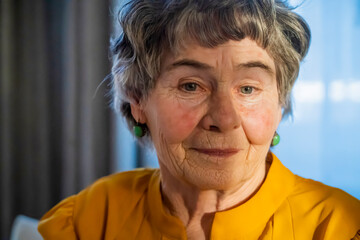 Portrait of an old beautiful woman with smiley face.