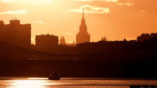 Magical sun set view in Moscow. Moscow river and Krymsky bridge and Moscow State University is in the frame. 