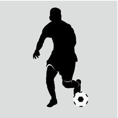 The soccer player is dribbling the ball