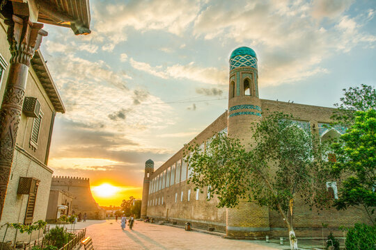 Sunset in old   town of   old Khiva   and blue-green heads of Minarets in Khiva