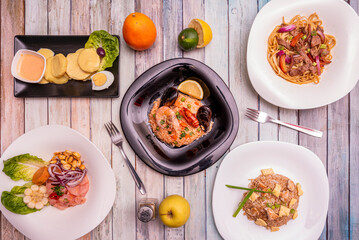 Peruvian food recipes with seafood rice, chaufa rice, huancaina potatoes, lomo saltado and fresh fruits
