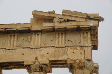 Athens, Greece: Detail of the Parthenon, 447-438 BCE, at the Acropolis of Athens, under a hazy sky caused by dust pollution.