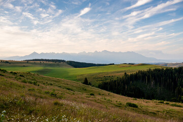 High Tatras from Panska Hola, Low Tatras National Park Slovakia.Green meadows and mountains in the background. © Filip