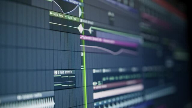 Music sequencer - playhead moves along the music track. The process of creating music on a computer, screen
