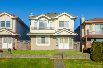 Houses in suburb at Spring in the north America. Luxury houses with nice landscape.