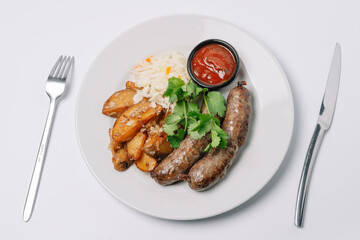 grilled steak with potatoes and vegetables