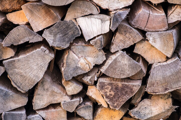 A close up of a stack of split fire wood.