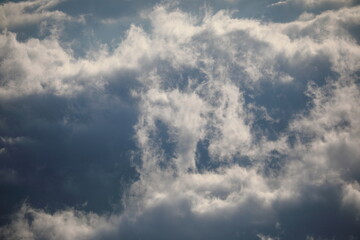 Fototapeta na wymiar rising clouds in the sky