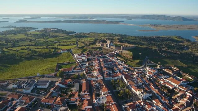 Aerial. View from above village and castle Mourao district Evora. Portugal. Castle facade entrance with tower in Alentejo