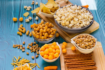 Salty snacks served as party food in bowls
