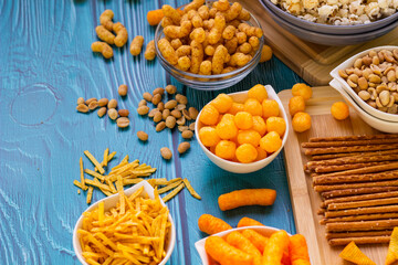 Salty snacks served as party food in bowls