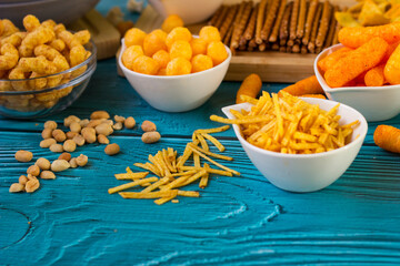 Salty snacks served as party food in bowls