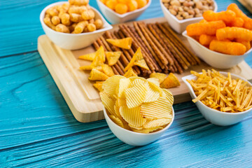 Salty snacks on the table ready to party