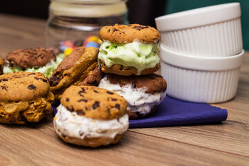 Chocolate chip ice cream cookie sandwiches with vanilla, chocolate and pistachios