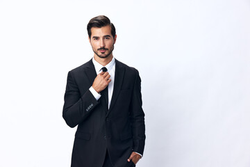 Portrait of a man in an expensive business suit on a white background isolated, copy space. Businessman startup technology