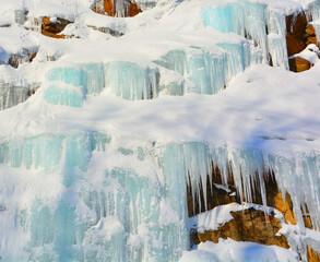 Winter landscape ice wall in Shefford mountain, ice runs off the rock Eastern township  Quebec, Canada