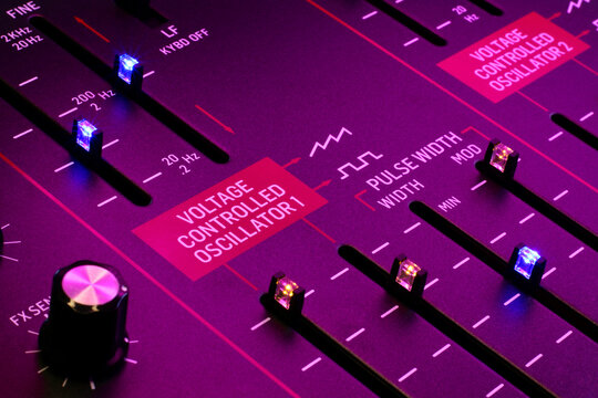 Vintage analog synthesizer with voltage controlled oscillator and pulse width modulation sliders, Synthwave 