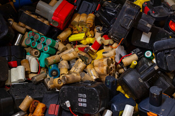 Old used batteries and accumulators of various types