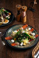 salad with salmon vegetables and herbs