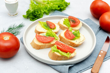Bruschetta sandwich bread toast with soft cheese ricotta,tomato,basil.Tasty healthy vegetarian food
