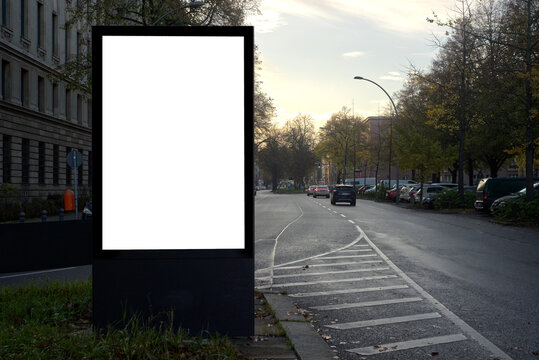 Empty white advertising poster on a street in Berlin.