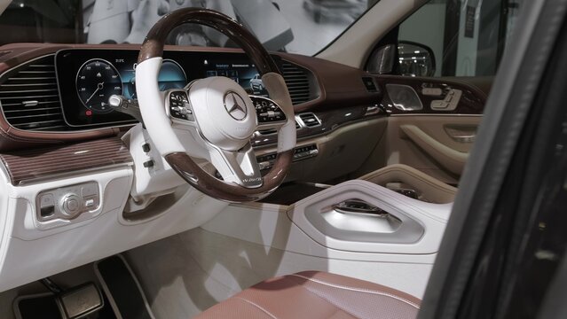 Electronic digital dashboard and steering wheel of newest Mercedes Maybach GLS. Panoramic closeup view. Moscow, Russia - Oct, 2022