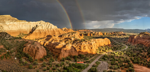 Double rainbow after a rain storm at sunset lighting up the beautiful rock formations at Kodachrome Basin State Park - Utah