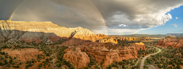 Rainbow after a rain storm at sunset lighting up the beautiful rock formations at Kodachrome Basin State Park - Utah