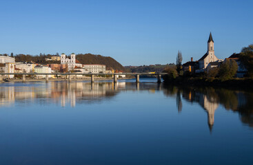 Fototapeta na wymiar Cityscape of Passau, Germany and the Inn river at the confluence with the Danube