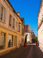 Fototapeta na wymiar City street of Sens in afternoon. Sub-prefecture of Yonne department in north-central France.
