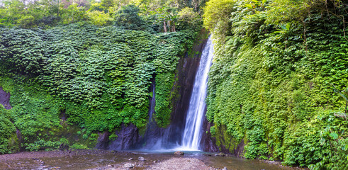 Naklejka na ściany i meble Munduk waterfall in Bali