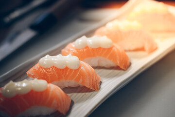 Salmon sushi is a popular fish dish. sushi is a street food of japan and new business in the world.