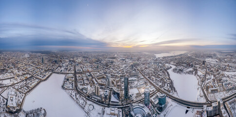 Yekaterinburg aerial panoramic view in Winter at sunset. Ekaterinburg is the fourth largest city in Russia located in the Eurasian continent on the border of Europe and Asia.