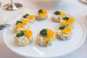 Catering table, beautifully decorated banquet with variety selection of different food snacks and appetizers on a corporate birthday party event or wedding celebration, delicatessen setting