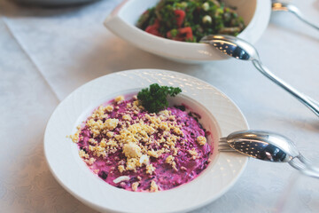 Catering table, beautifully decorated banquet with variety selection of different food snacks and appetizers on a corporate birthday party event or wedding celebration, delicatessen setting