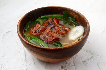 Freshly cooked Filipino food called Sinigang na crispy liempo