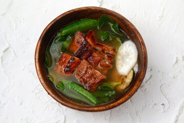 Freshly cooked Filipino food called Sinigang na crispy liempo