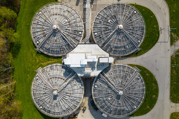 Fototapeta na wymiar Aerial view of waste water treatment plant. Drinking tap water treatment process. Drinking bottle water production and distribution, filtration and cleaning.
