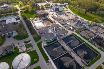 Aerial view of waste water treatment plant. Drinking tap water treatment process. Drinking bottle water production and distribution, filtration and cleaning.