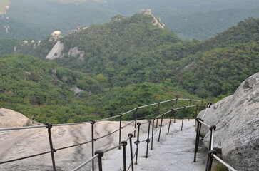 Stairs to climb a mountain in Bukhansan National Park, Seoul, South Korea