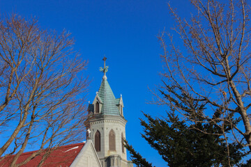 Fototapeta na wymiar 教会の屋根と青空 