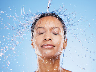 Beauty, water and splash with black woman and shower for hydration, moisture and spa luxury....