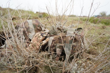 Almaty, Kazakhstan - 04.14.2022 : Sniper's shelter at the training ground. Military exercises. © Vladimir