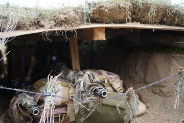 Almaty, Kazakhstan - 04.14.2022 : Sniper's shelter at the training ground. Military exercises.