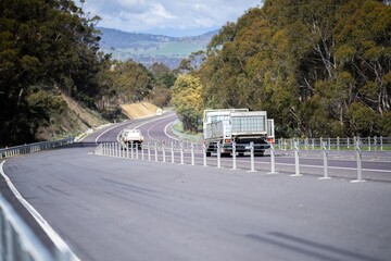 old couple travelling on a vaccation on a highway in america