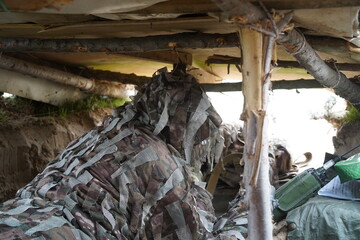 Almaty, Kazakhstan - 04.14.2022 : Sniper's shelter at the training ground. Military exercises.